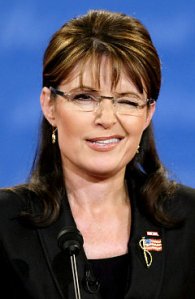 Sarah Palin winks to the cam as she announces that she found herself innocent of all charges. "Well, darn it, we sure showed 'em how to conduct a six-pack style investigation, didn't we, fellas?"